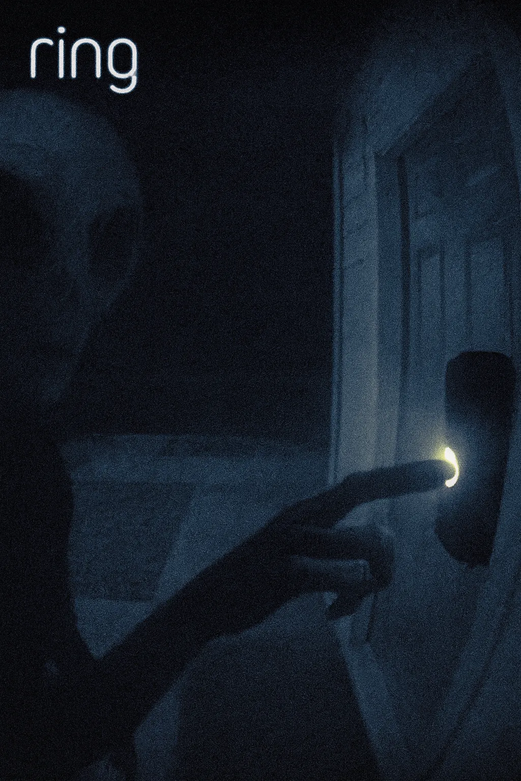 Grainy Ring doorbell footage showing a shadowy alien-like figure in California at night